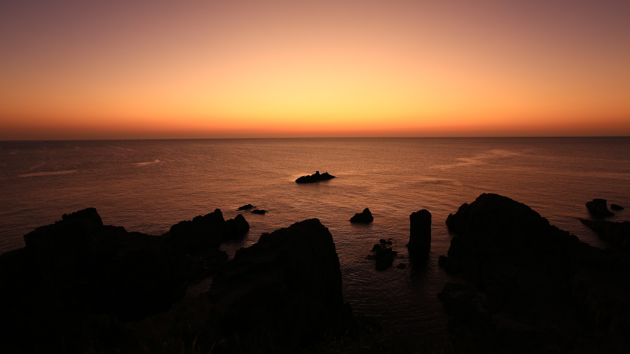 The Majestic Columnar Joints and the Golden-Hued Sunset of Tojinbo